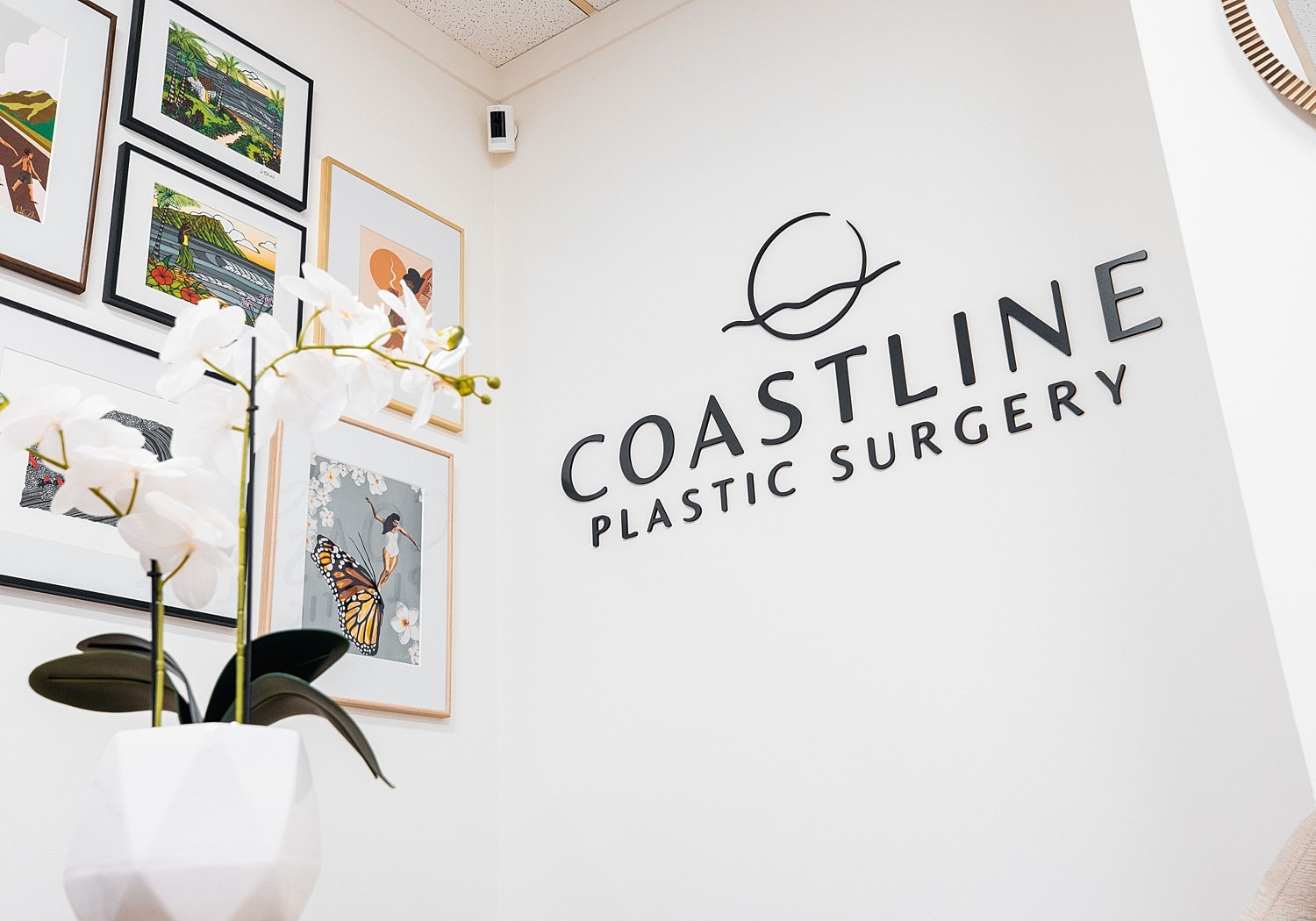 Coastline Plastic Surgery office interior with artwork.