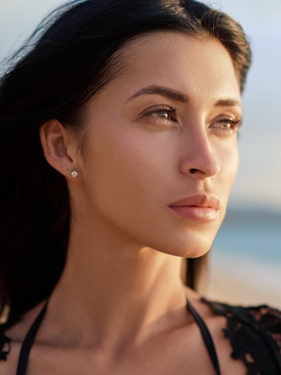 Portrait of a woman with a serene expression.