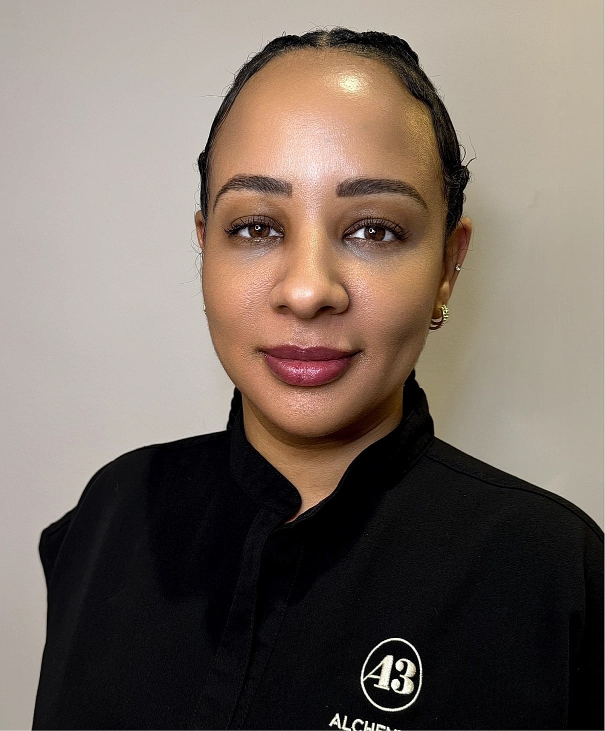 Professional woman in a black shirt portrait.