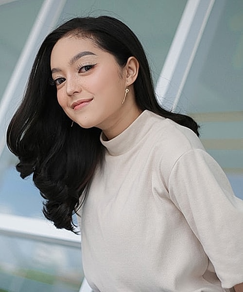 Colorful geometric paper layers arranged stylishly.